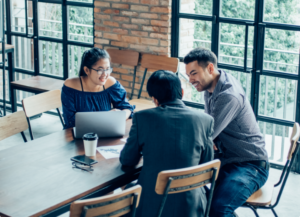 lawyer talking to two clients